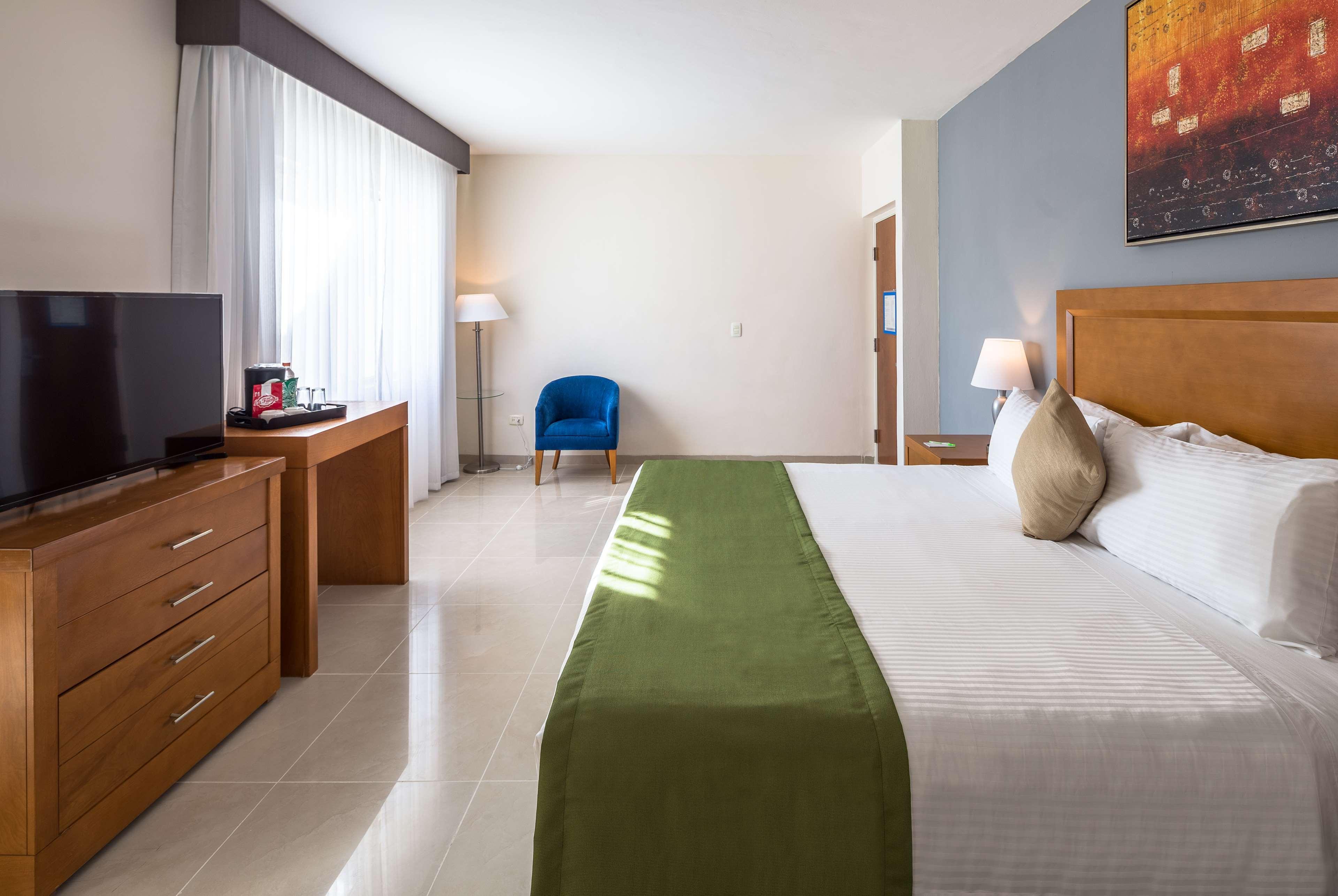 Wyndham Garden Playa Del Carmen Hotell Eksteriør bilde A room at the hotel